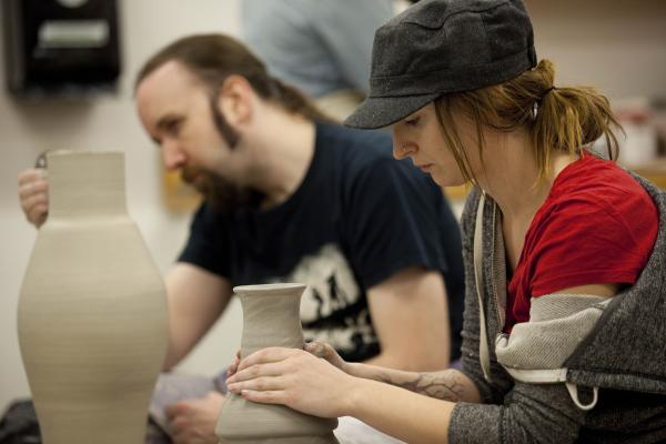 Visual Arts students attending a pottery class