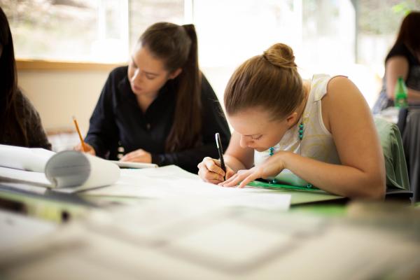 Two female students of the Bachelor of Science, Physics University Transfer Program working on a project