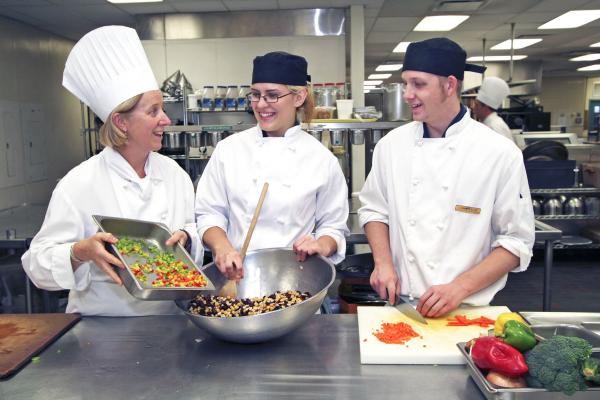 Three students of the Culinary Arts program at VIU’s Culinary School