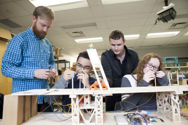 Students of the Fundamentals of Engineering Certificate Program working on a project