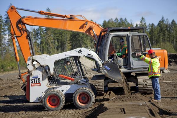 Vancouver Island University’s Heavy Equipment Operator courses' students working at a construction site at the school for heavy equipment operators