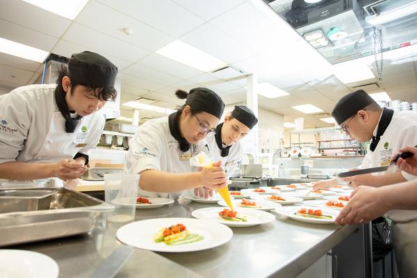Students working in kitchen