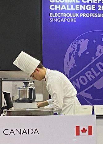 Otis-james Crabbe cooking in a competition