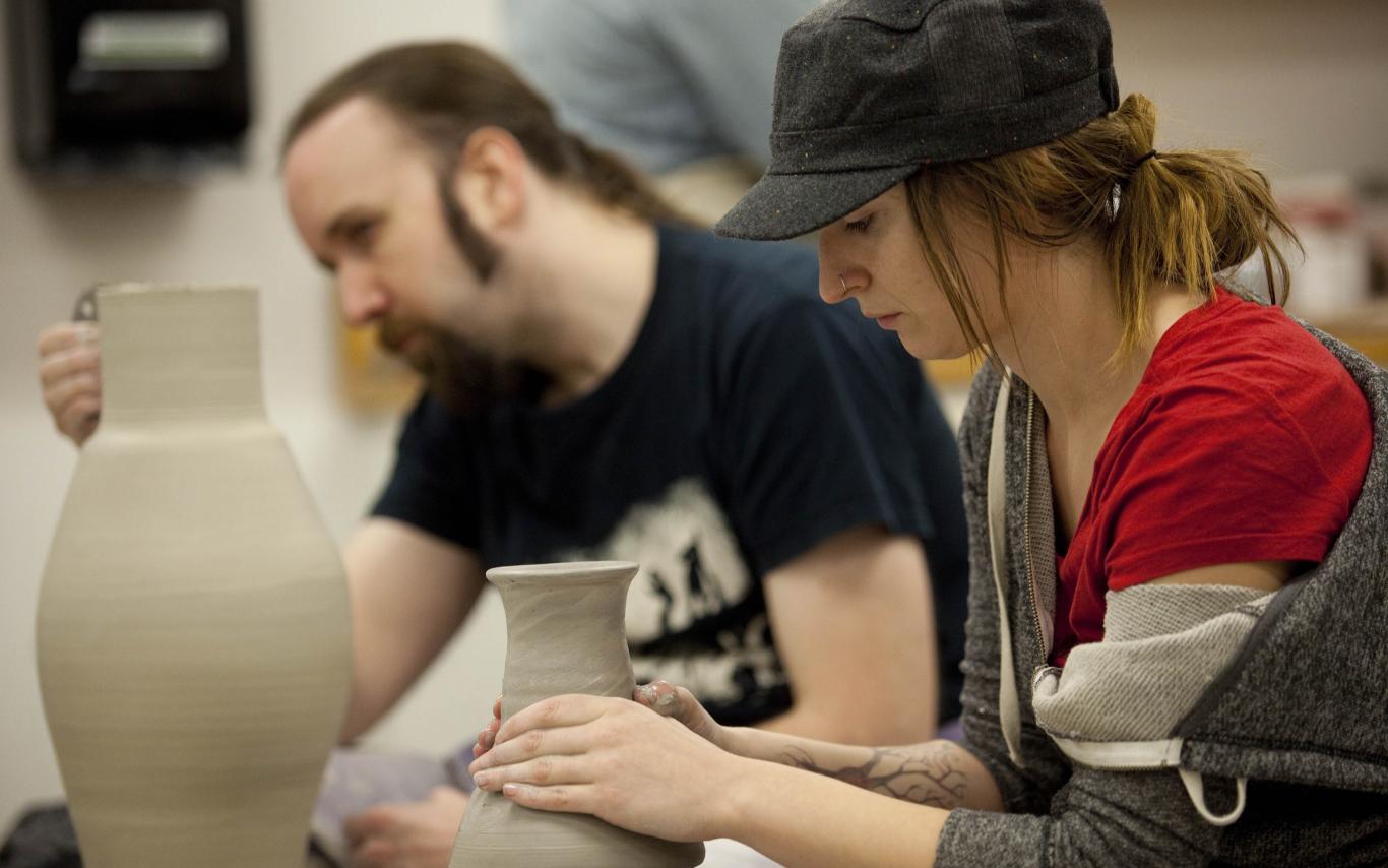 Visual Arts students attending a pottery class