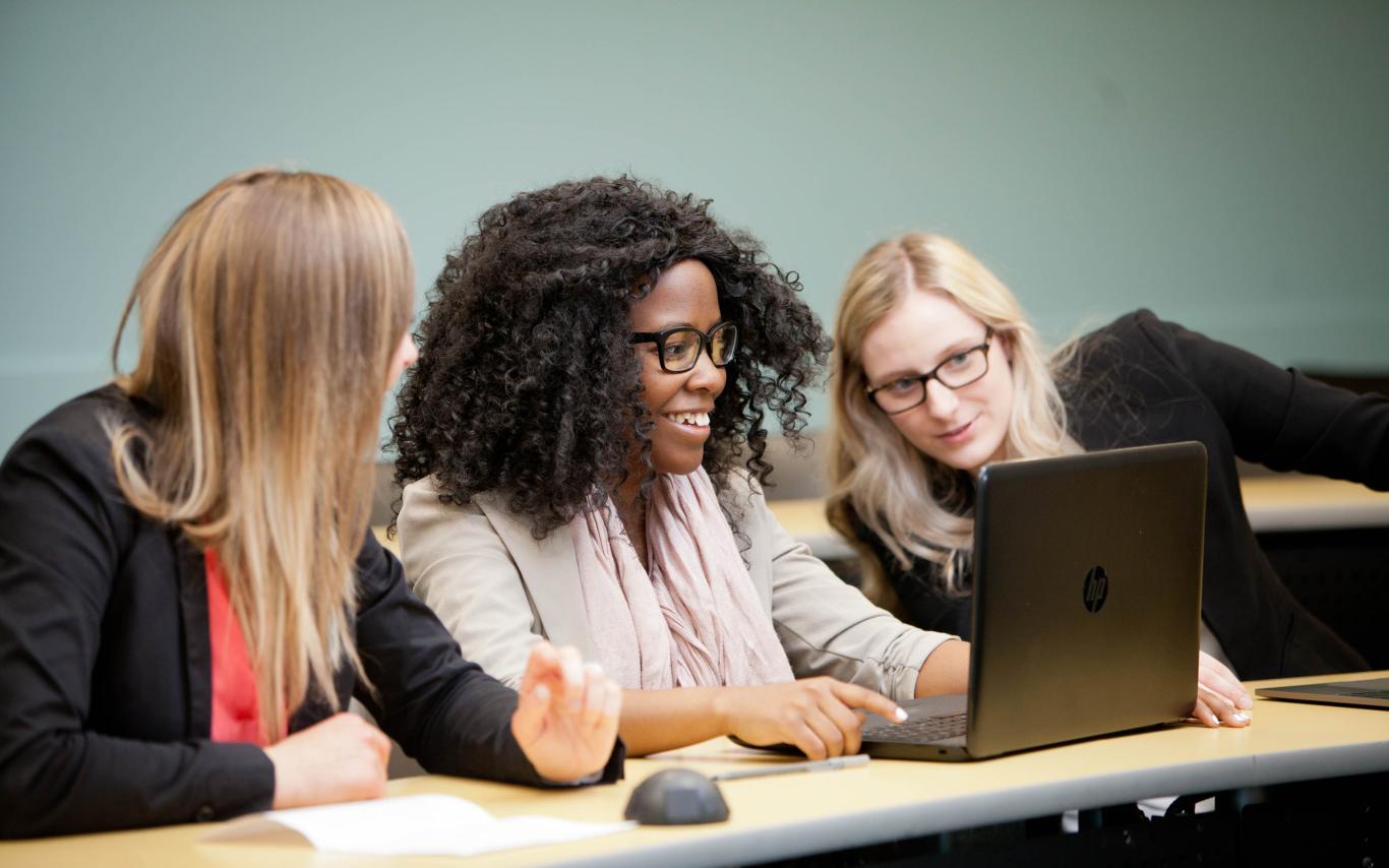 Students of the Bachelor of Arts, Minor in Business program discussing ideas