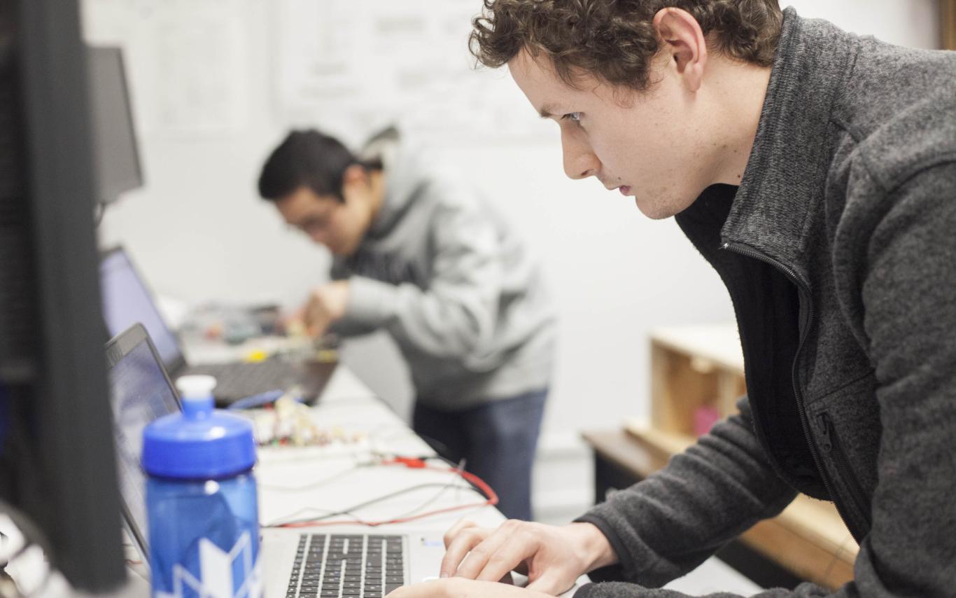 Students of the Bachelor of Arts, Minor in Computing Science program working on laptops