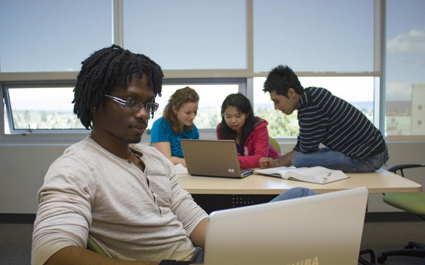 Students of the Bachelor of Arts, Minor in Mathematics program working on a paper