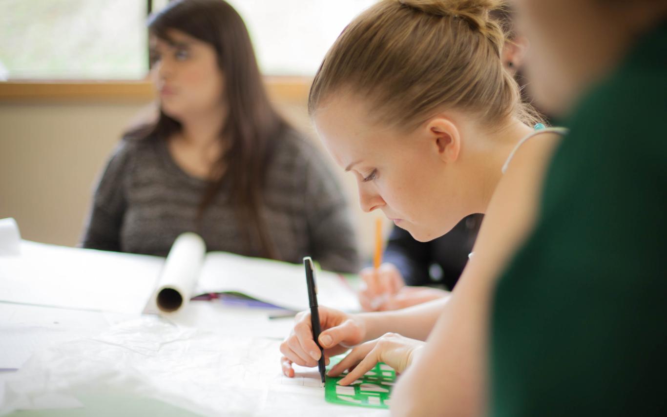 Students of the Interior Design Program drawing a sketch