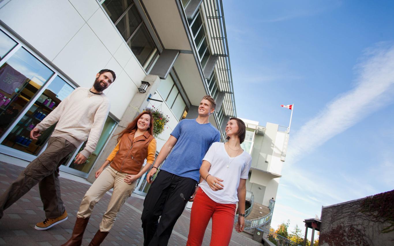 Students of the Business Certificate program in front of Vancouver Island University's bookstore