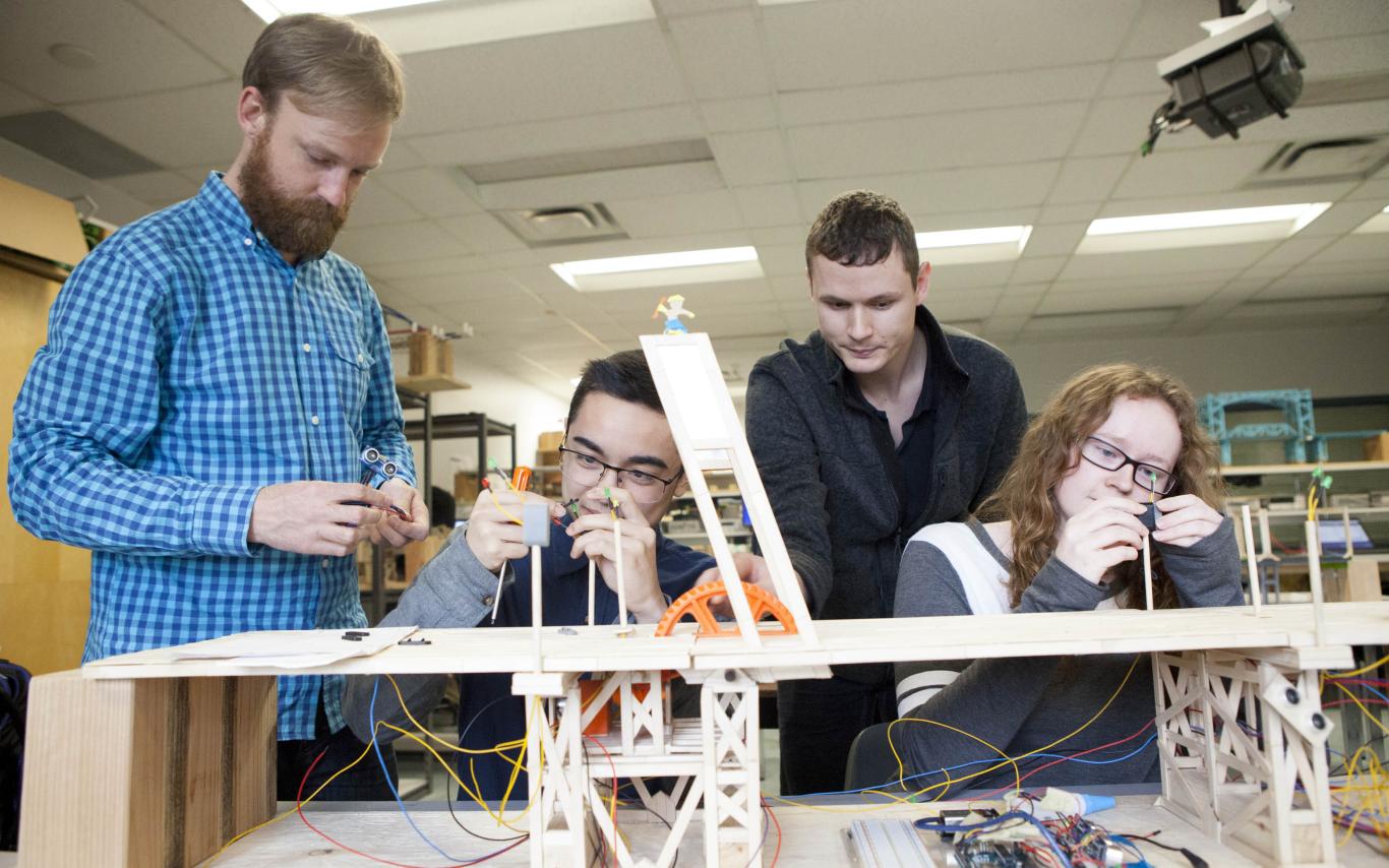 Students of the Fundamentals of Engineering Certificate Program working on a project