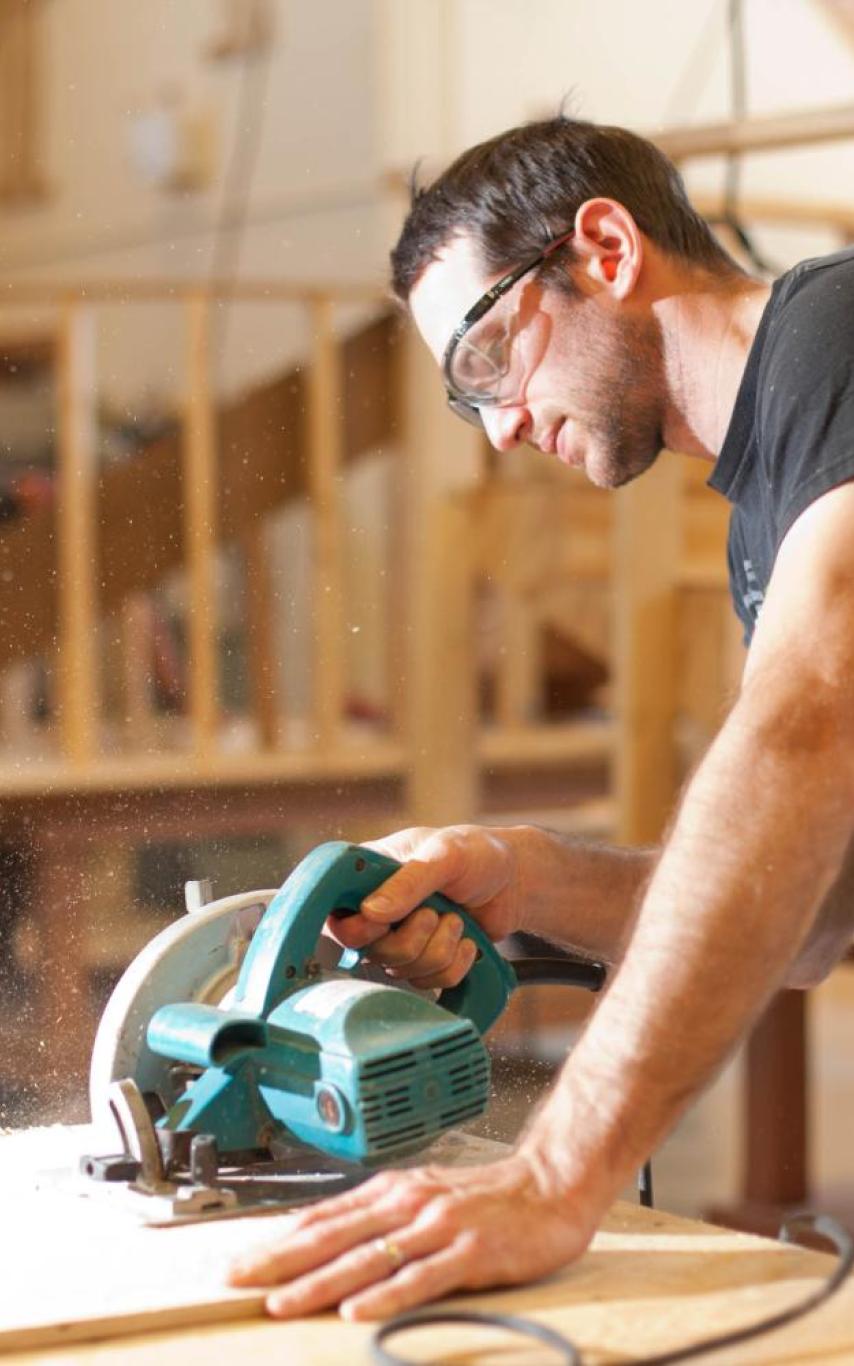 Student using power saw