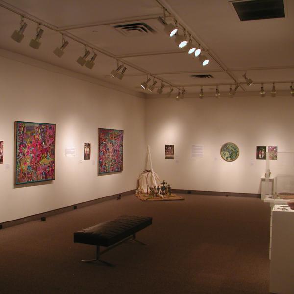 A gallery with art on the walls