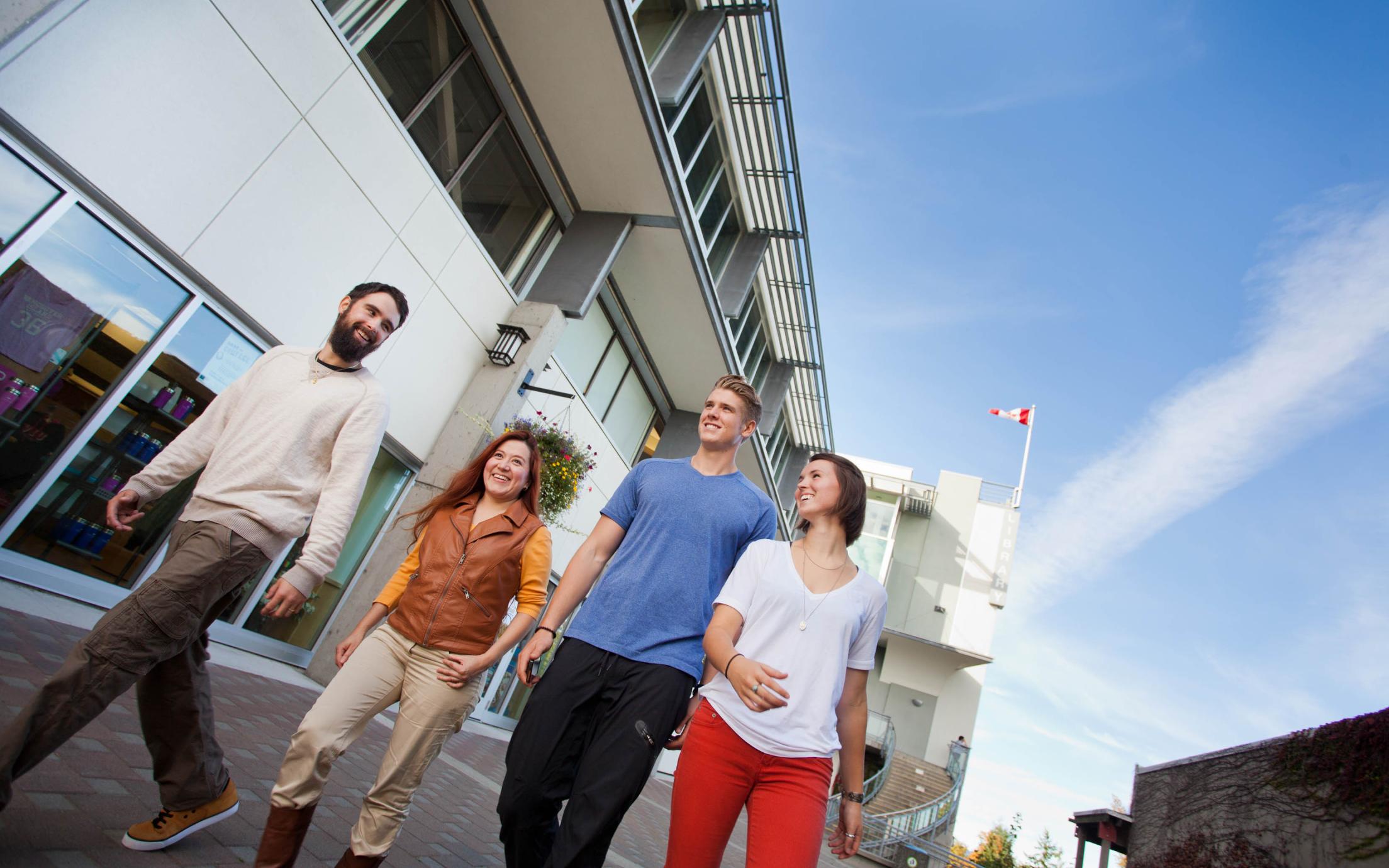 Students of the Business Certificate program in front of Vancouver Island University's bookstore