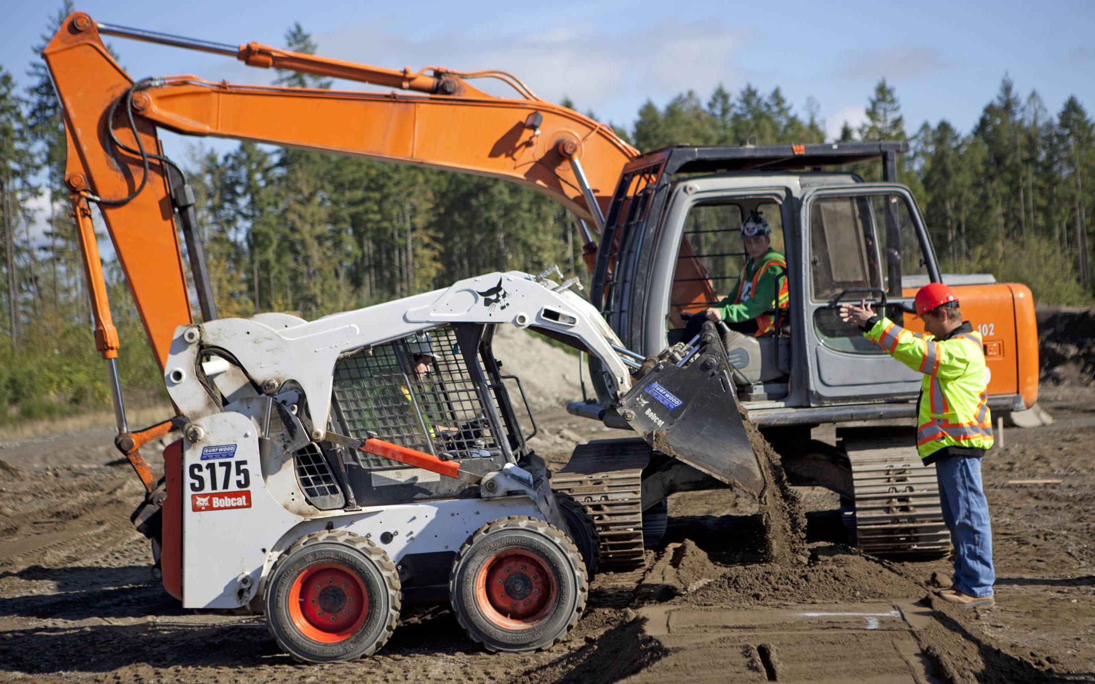Vancouver Island University’s Heavy Equipment Operator courses' students working at a construction site at the school for heavy equipment operators