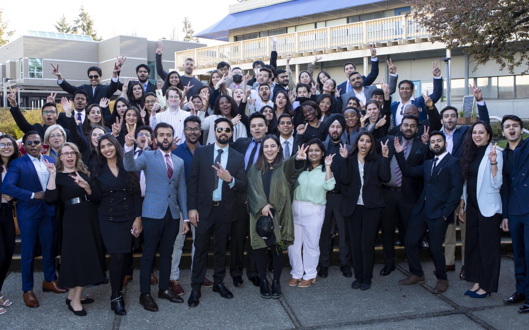 MBA students posing as a big group