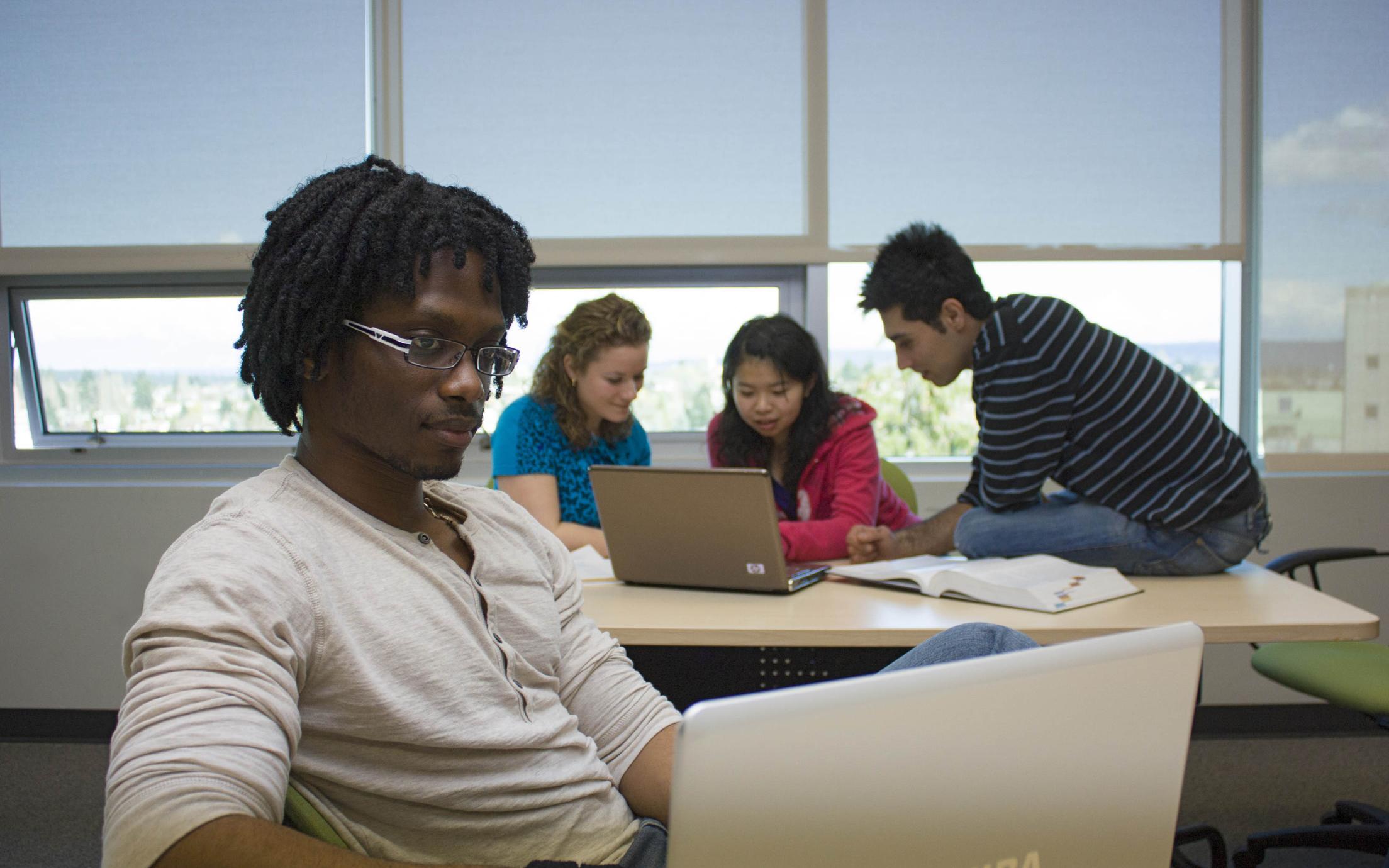 Students discovering the importance of teaching courses online and online education