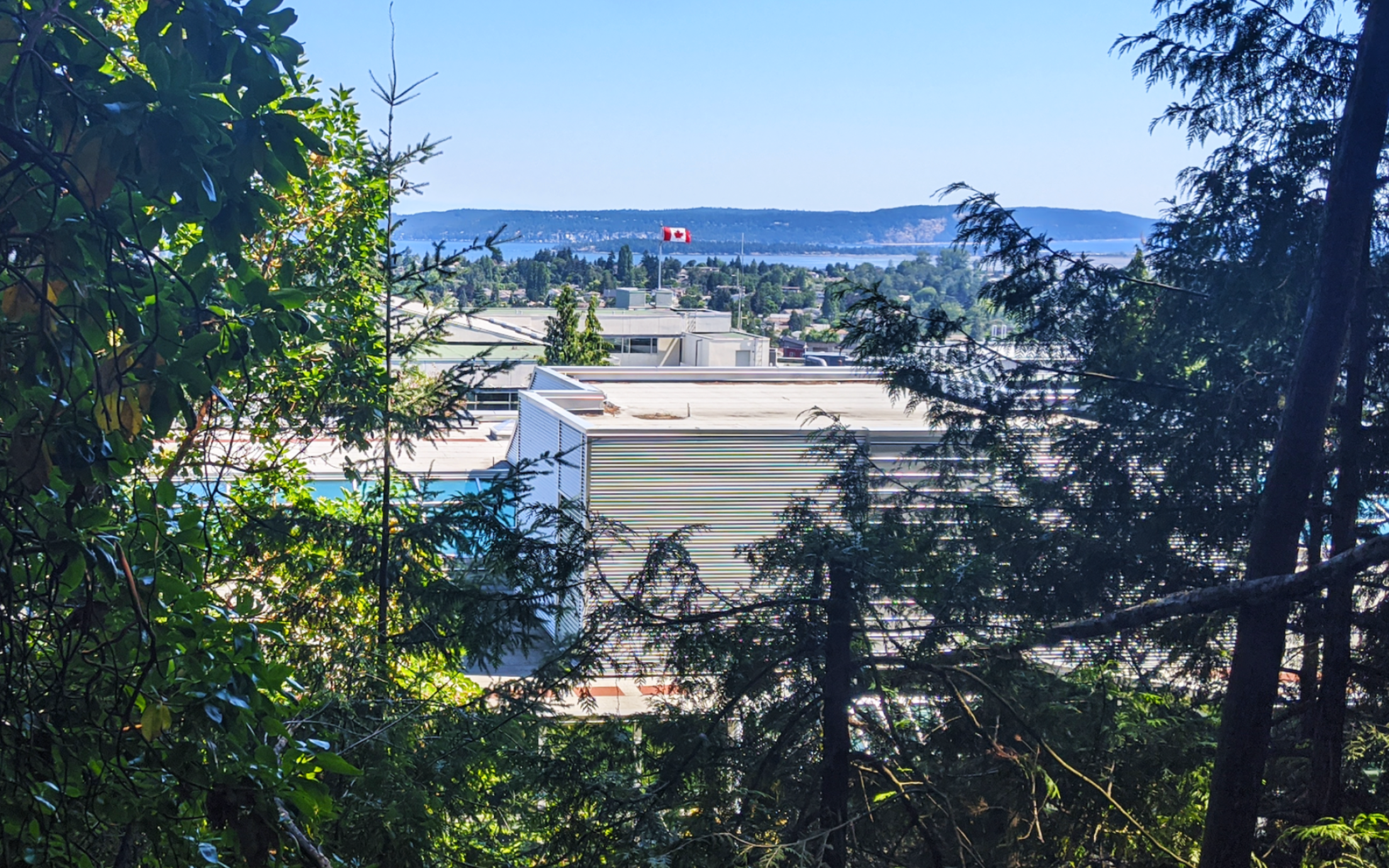 View of VIU campus looking towards Gabriola Island on sunny day