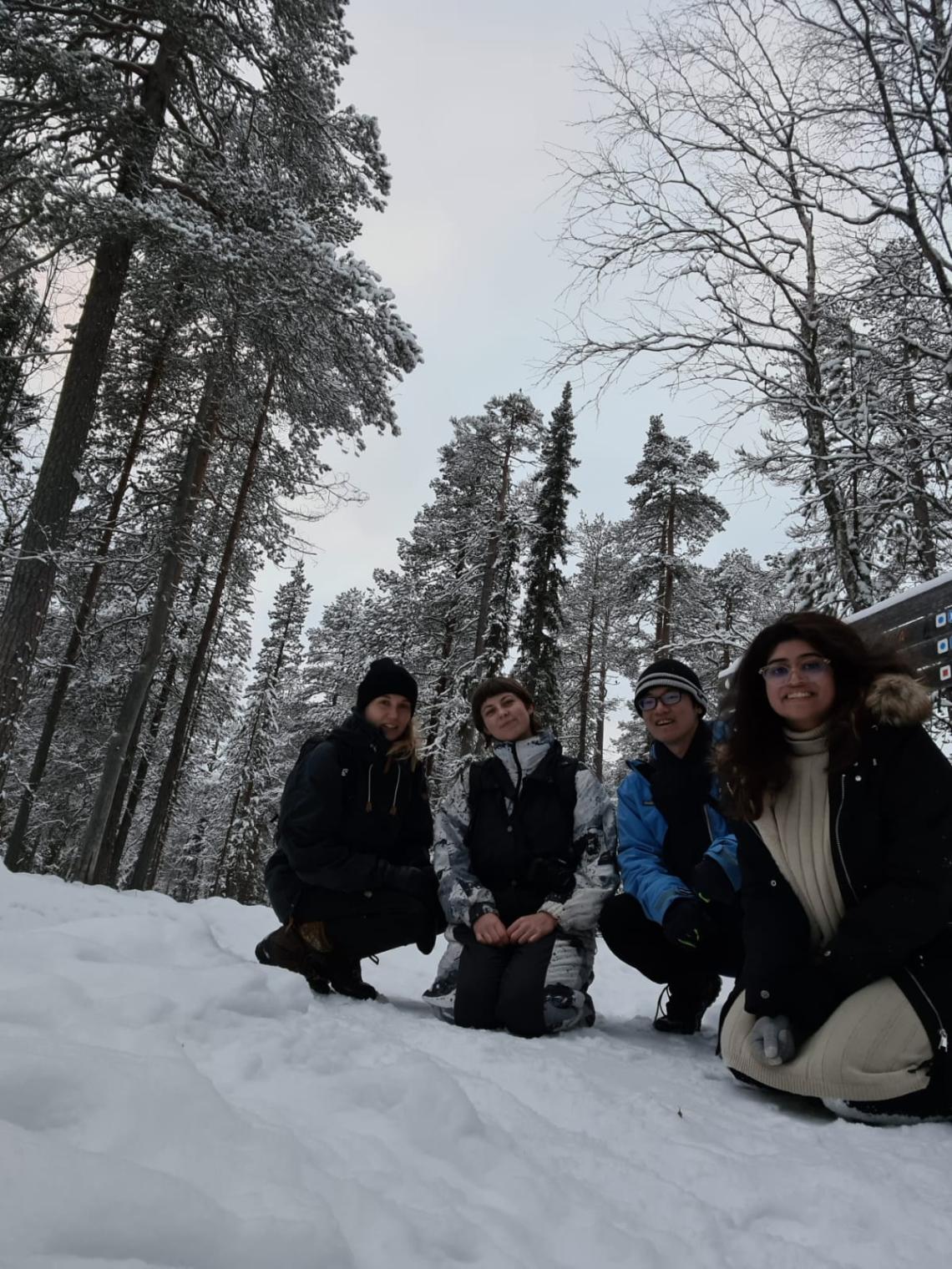 Group photo in a snowy forest