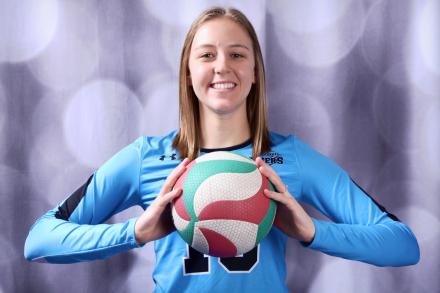 Danielle Groenendijk holding a volleyball.