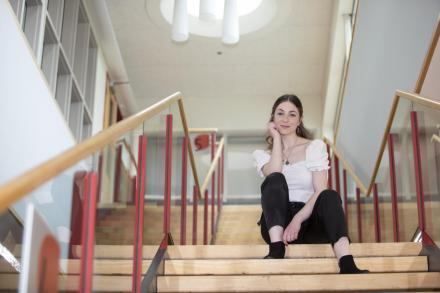 woman sitting on a set of stairs