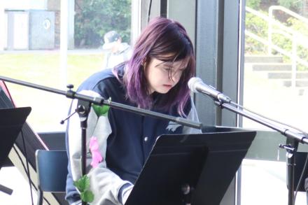 Ceridwen Nord does a dramatic reading during VIU's International Women's Day event.