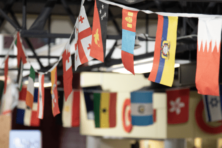 Flags from around the world strung on a banner