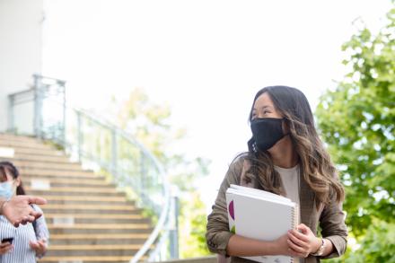 VIU students wearing mask by the library