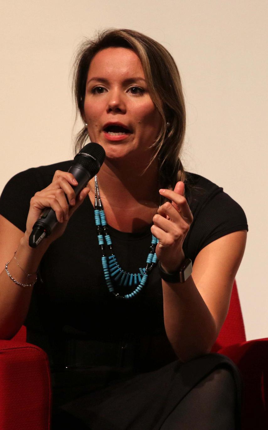 Woman holding a microphone