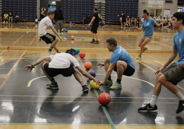 Group of people playing dodgeball.