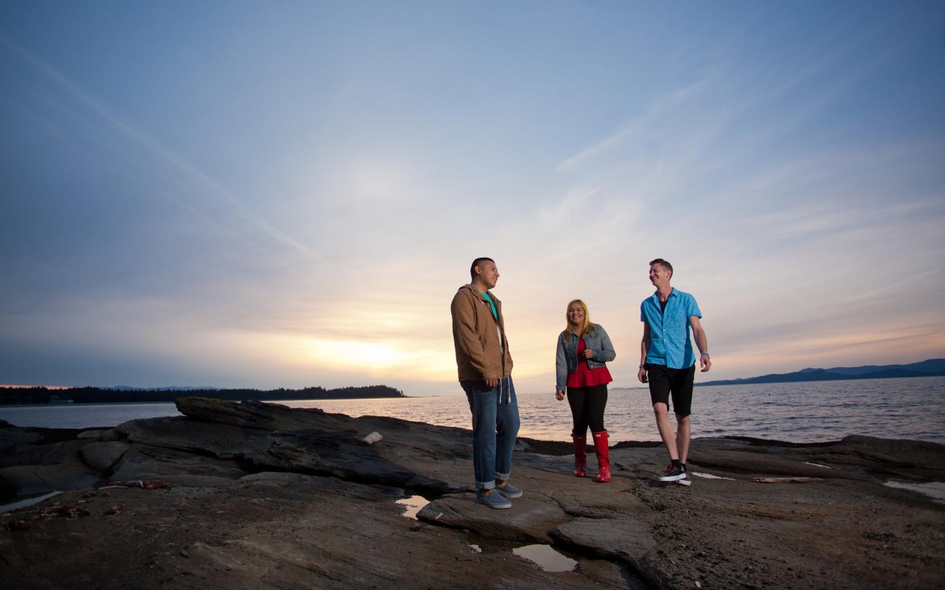 Young people exploring a beach